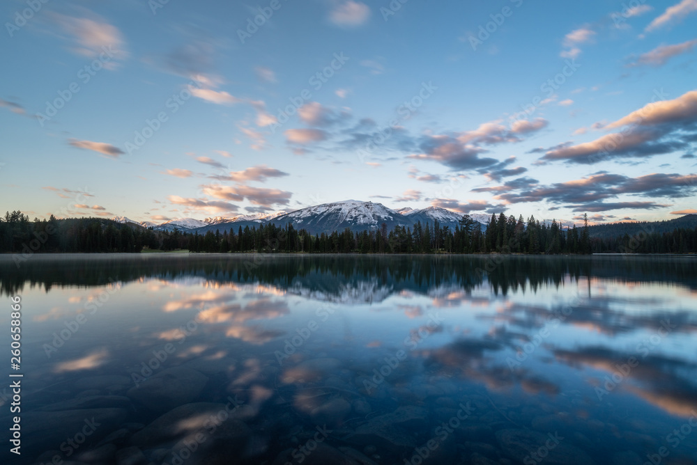 Sunrise reflection of mountain on lake