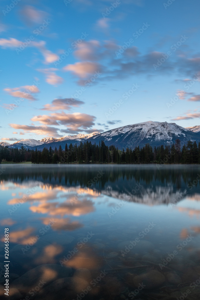 Fototapeta premium Sunrise mountain reflection in lake