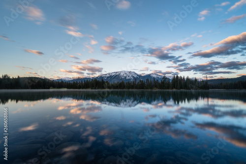Sunrise reflection of mountain on lake © Pauline