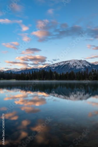 Sunrise mountain reflection in lake