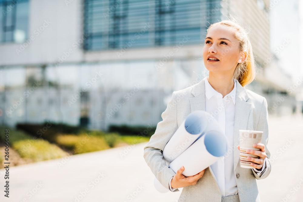 Businesswoman on her way to work. Young manager having coffee. Businesswoman on her way to work. Young manager having coffee.