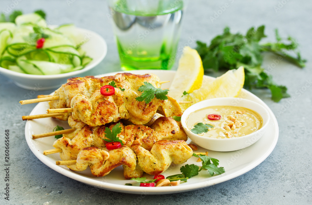 Chicken breast with curry with peanut sauce.