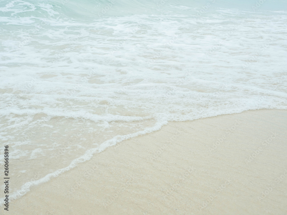 Sea water wave and water foam on beach background Sea water wave and water foam on beach background