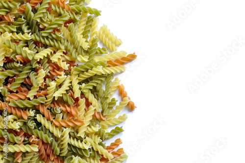 Pasta fusilli tricolore isolated on white background