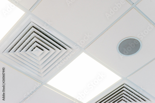 Design and details of the modern device ceilings in the room.