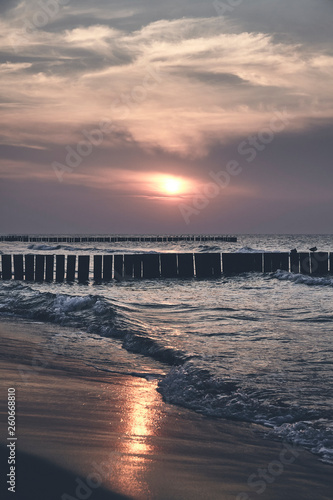 Scenic sunset over the sea  color toning applied.