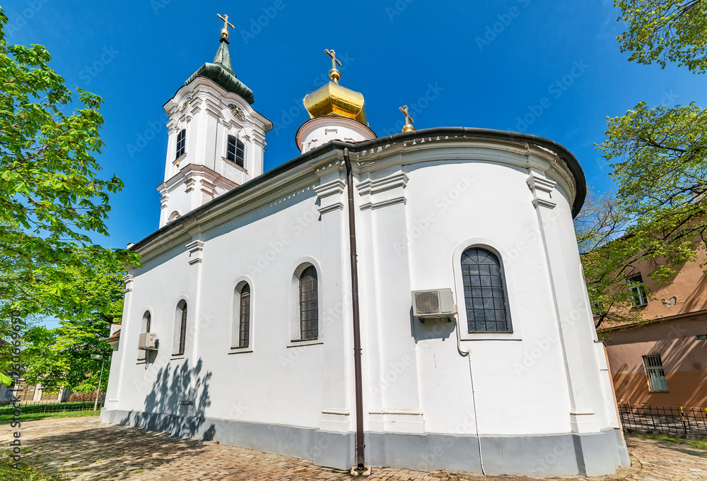 Novi Sad, Serbia - April 06, 2019: Church Nikolajevska Porta at Novi Sad in Serbia. The Nikolajevska church is the smallest Orthodox church in Novi Sad. The church dates from the thirties of the 18th. Novi Sad, Serbia - April 06, 2019: Church Nikolajevska Porta at Novi Sad in Serbia. The Nikolajevska church is the smallest Orthodox church in Novi Sad. The church dates from the thirties of the 18th.