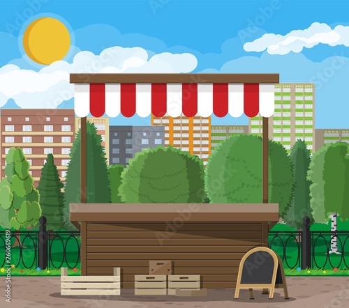 Traditional market empty wooden food stall with crates chalk board. City park, cityscape and trees. Sky with clouds and sun. Leisure time in summer city park. Vector illustration flat style