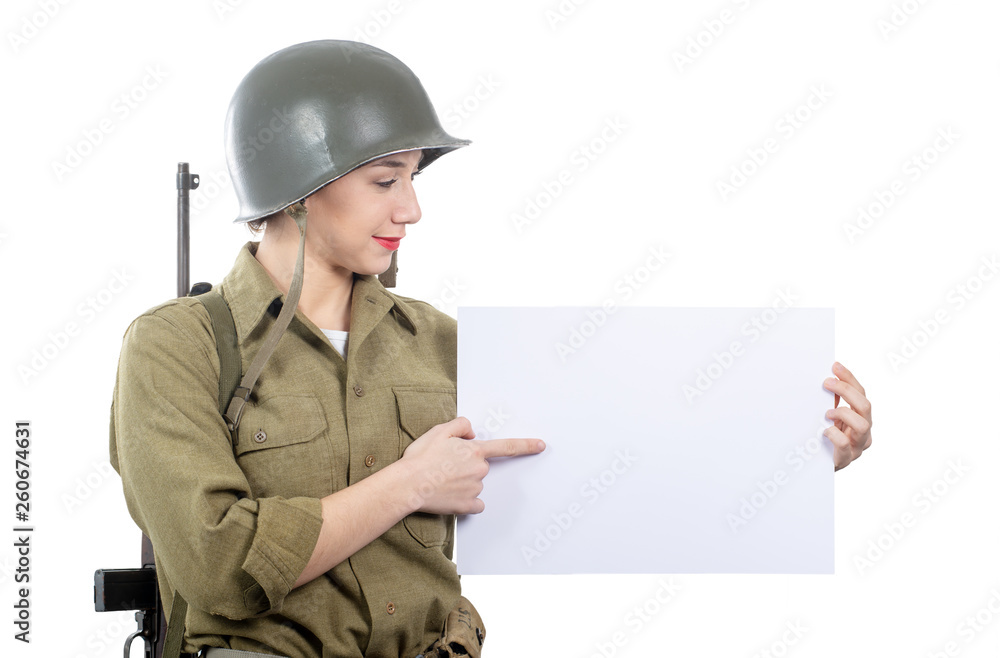 young woman dressed in American ww2 military uniform showing empty blank signboard young woman dressed in American ww2 military uniform showing empty blank signboard