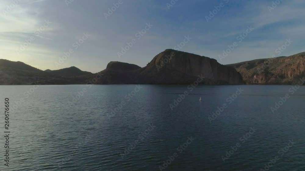 AERIAL - Drone Zoom Over Dock to Reveal Lake Surrounded by Mountains (Canyon Lake) AERIAL - Drone Zoom Over Dock to Reveal Lake Surrounded by Mountains (Canyon Lake)