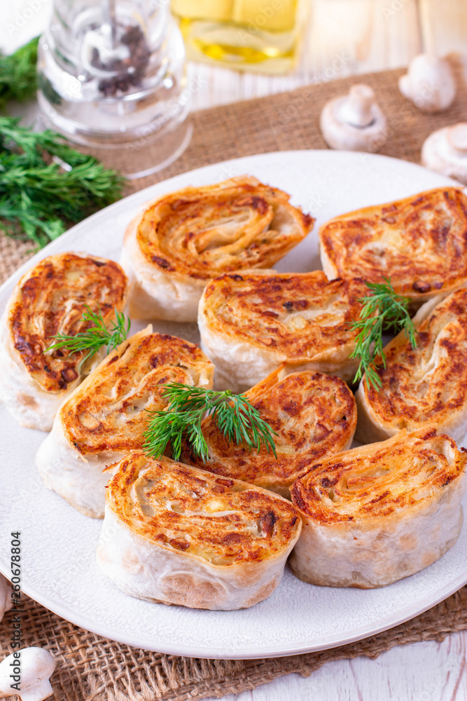 Fried lavash rolls with potatoes and mushrooms Fried lavash rolls with potatoes and mushrooms