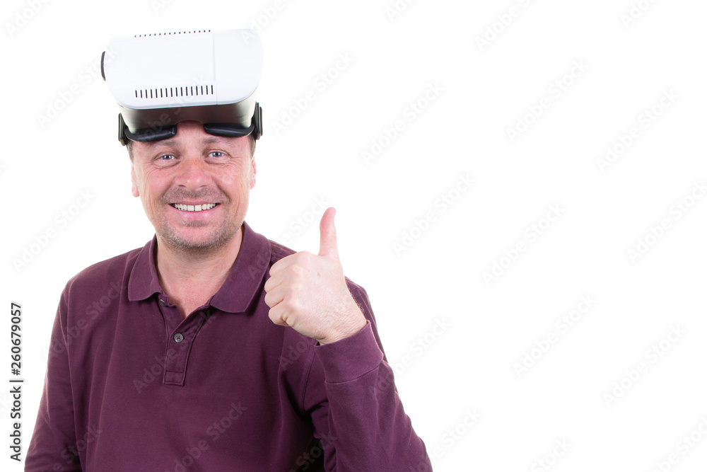 man playing in virtual reality goggles happy smile thumbs up in white background with copy space man playing in virtual reality goggles happy smile thumbs up in white background with copy space