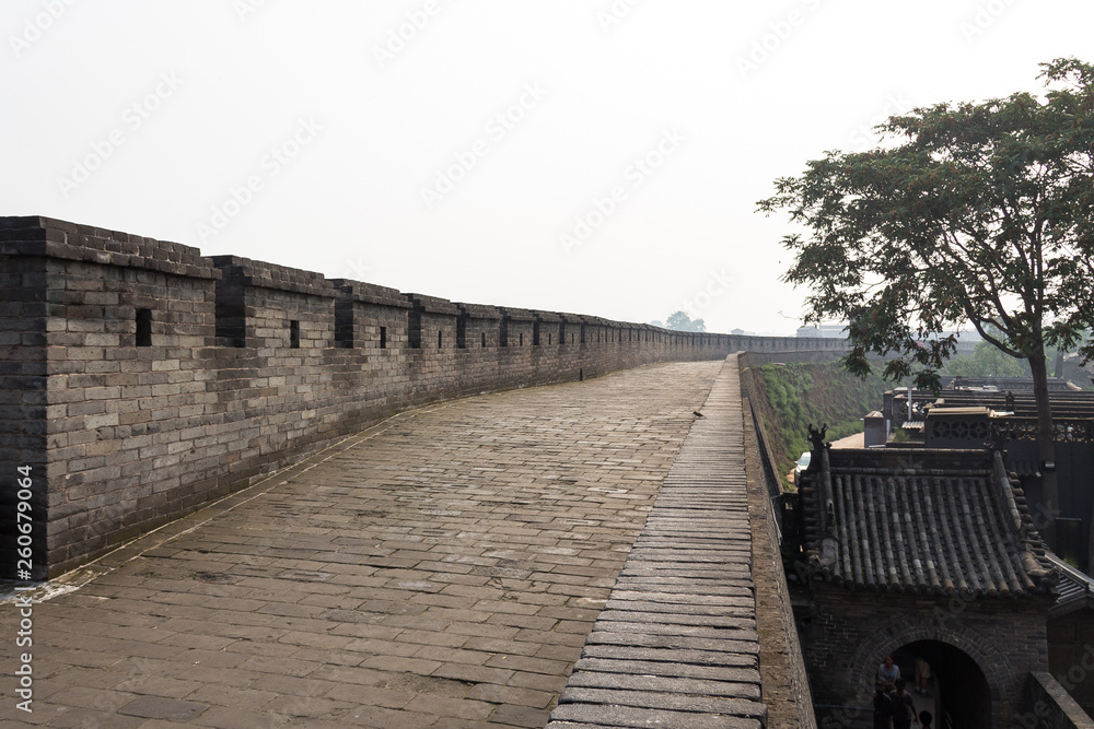 Pingyao, Shanxi province, China: walking on the ancient walls protecting the Old city of Pingyao, the most well preserved of all of China. UNESCO World Heritage Site