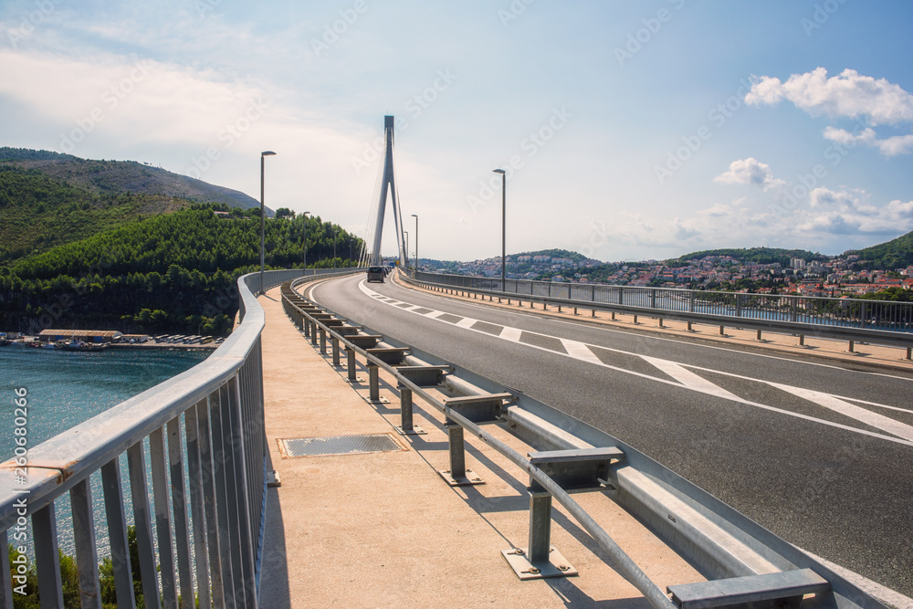 Franjo Tudjman bridge in Dubrovnik, part of the Adriatic highway E65 (Jadranska magistrala). Scenic daytime landscape, travel background