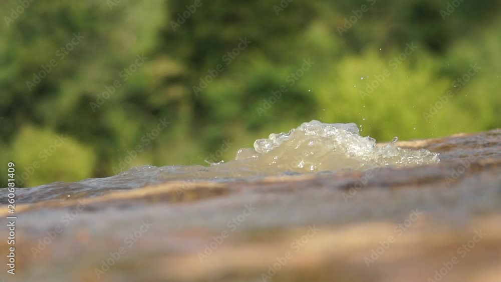 water flow on rock surface - slow motion water flow on rock surface - slow motion