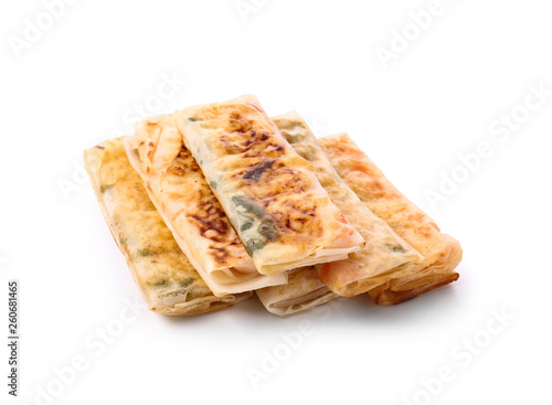 Tasty fried spring rolls on white background