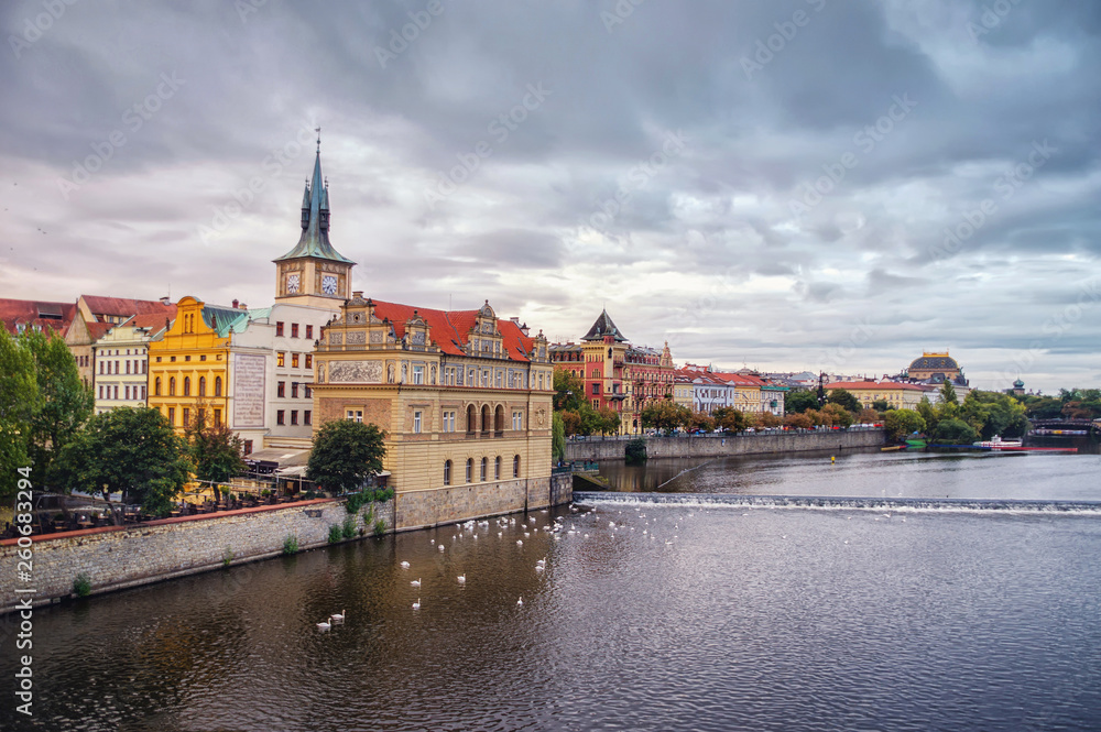 Scenic spring view of the Old Town pier architecture and Charles Bridge over Vltava river in Prague, Czech Republic .