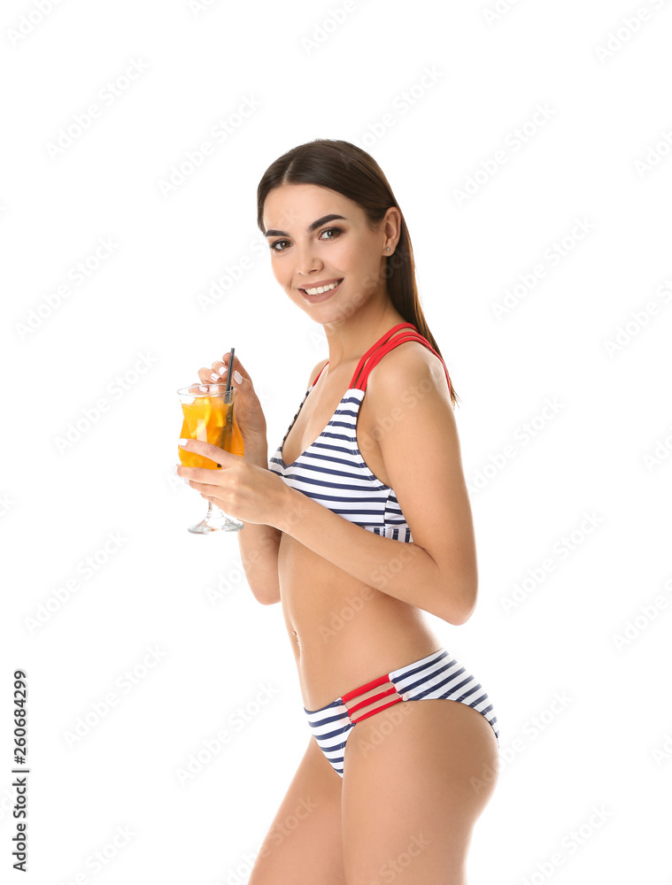 Beautiful young woman in swimming suit and with cocktail on white background Beautiful young woman in swimming suit and with cocktail on white background