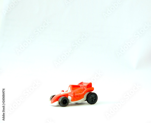Toy race car on a white background