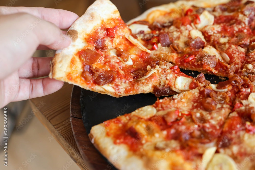 Delicious italian cuisine Pizza with garlic and bacon Delicious italian cuisine Pizza with garlic and bacon