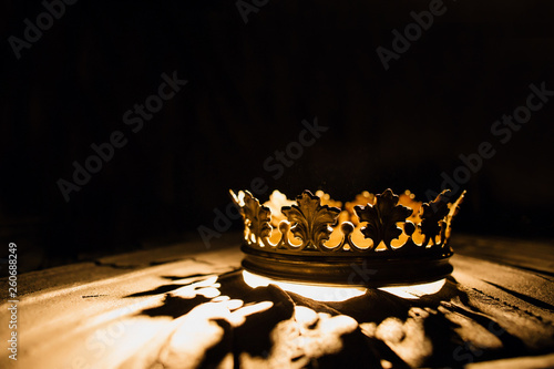 Crown of the real king on a black background. Game of Thrones. photo