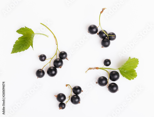 Fresh blueberries, red and black currants, gooseberries, summer berry ornament on a white background