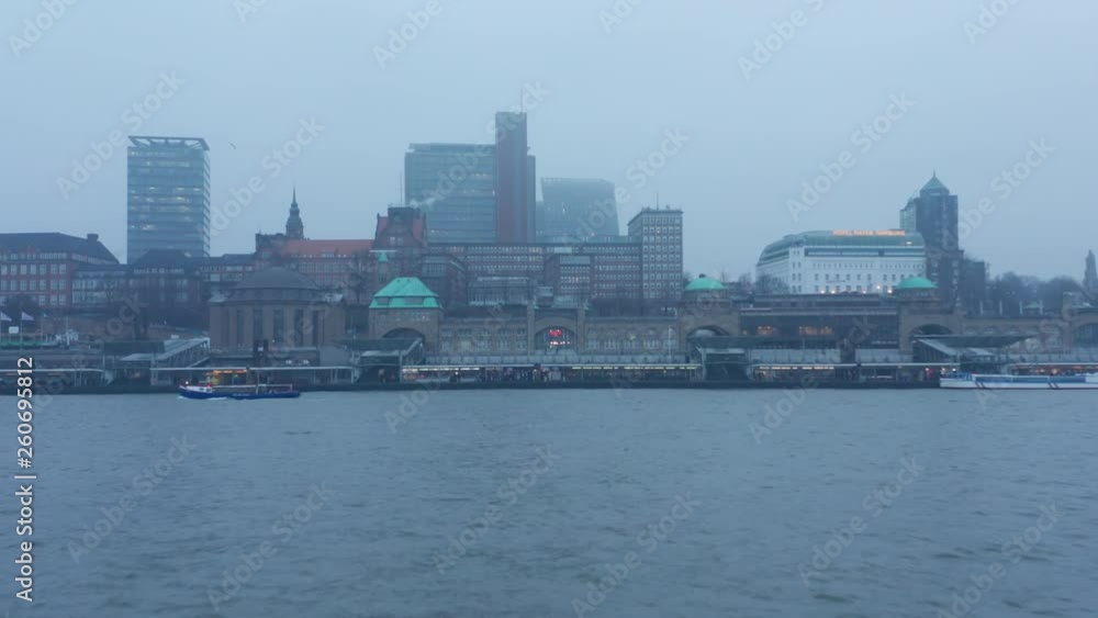 Push in on Landungsbruecken in Hamburg, Germany, and a pan shot of the city's skyline Push in on Landungsbruecken in Hamburg, Germany, and a pan shot of the city's skyline