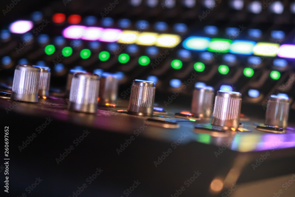 DJ CD player audio mixer and amplifier  in nightclub.