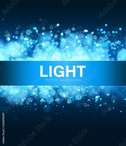 Light blue background with bokeh and sparks.