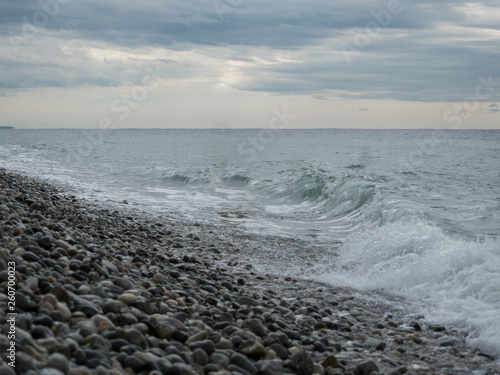 Sea waves on a pebble beach