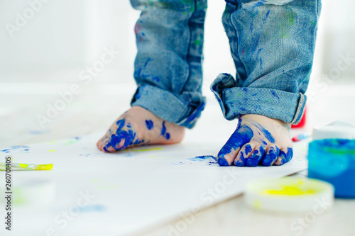 Little baby feet in paint