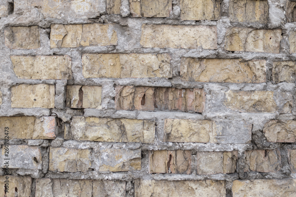 The texture of the old crumbling brick wall. The texture of the old crumbling brick wall.
