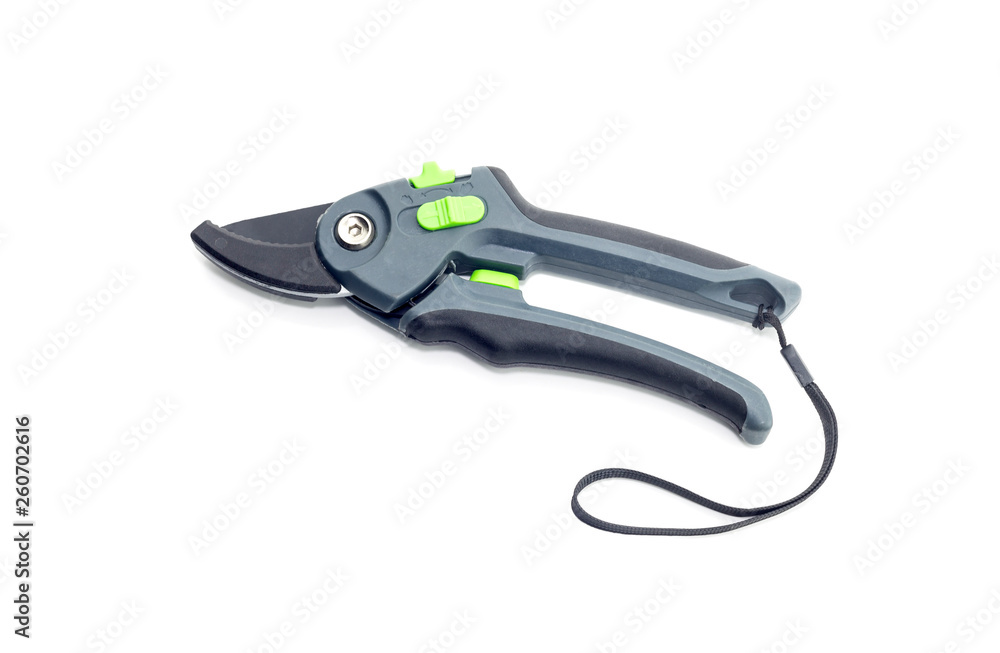 Garden pruner on a white background close-up Garden pruner on a white background close-up