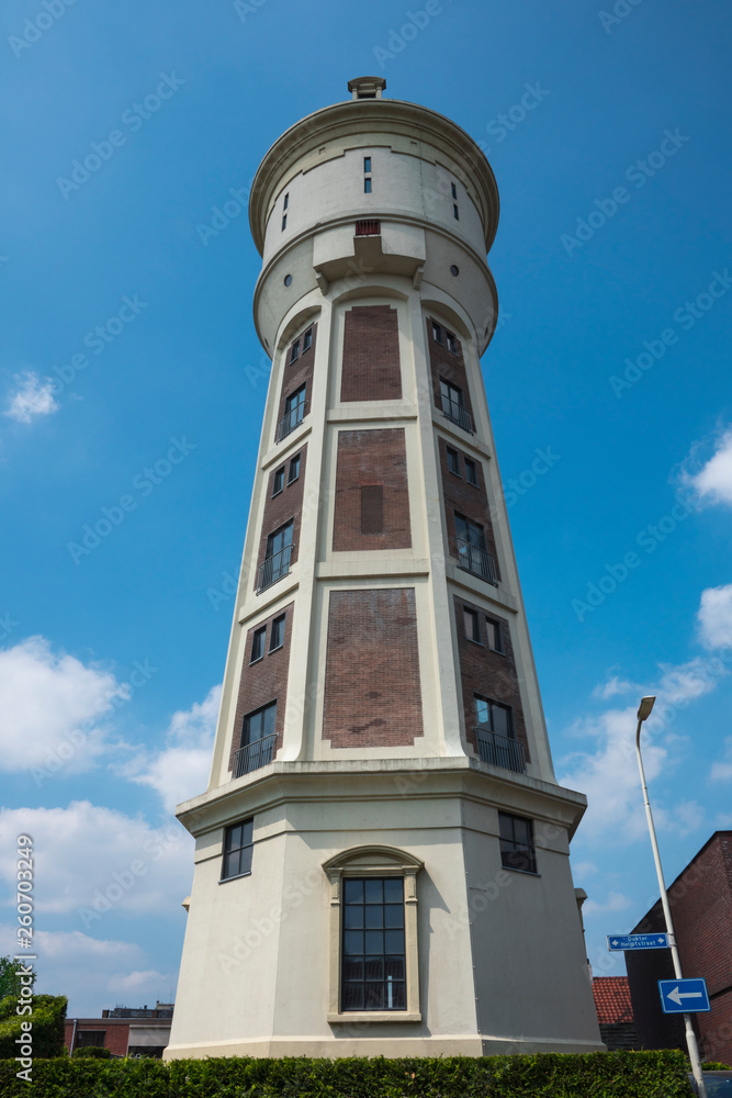 Water tower in Roosendaal, The Netherlands, against blue sky Water tower in Roosendaal, The Netherlands, against blue sky
