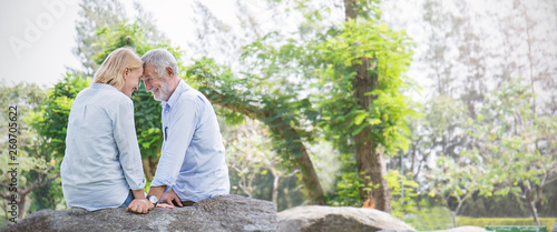 Happy old couple smiling in...