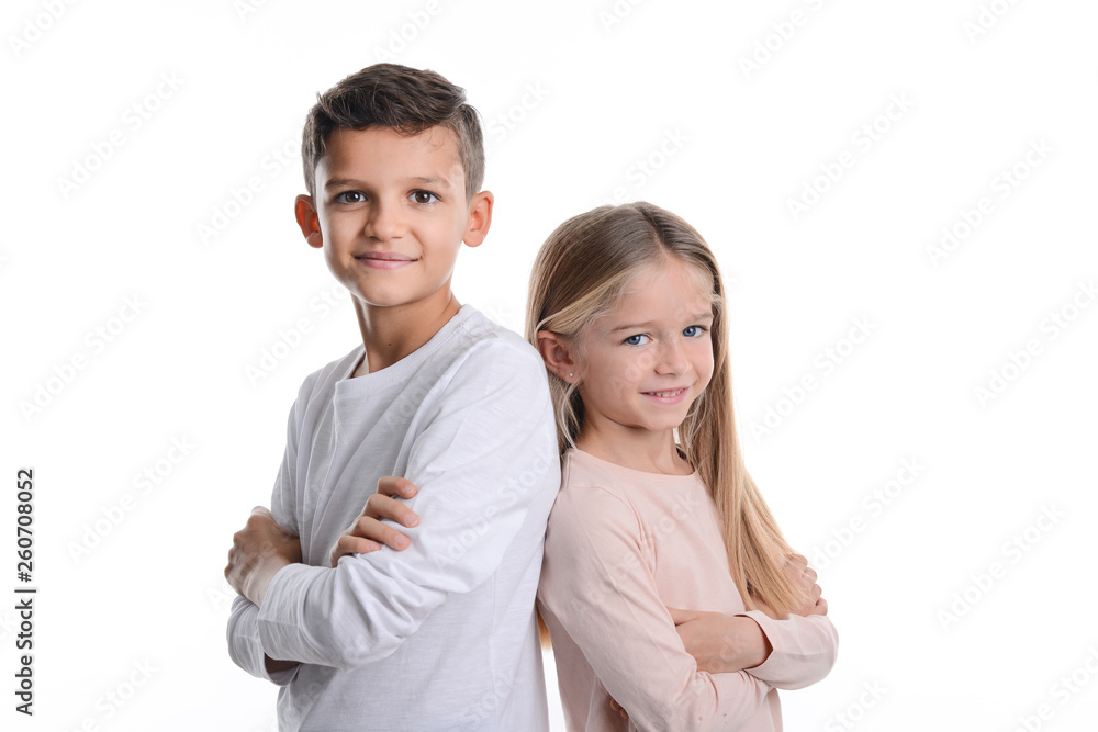 portrait of two young kids boy and girl sibling in studio shot on white background portrait of two young kids boy and girl sibling in studio shot on white background