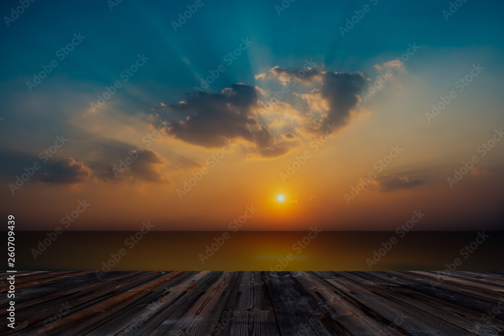 Beautiful sunset and blue sky and clouds with old wood floor background.
