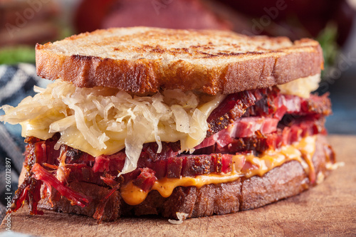Reuben Sandwich with corned beef, cheese and sauerkraut photo
