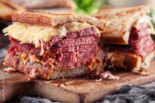 Reuben Sandwich with corned beef, cheese and sauerkraut photo