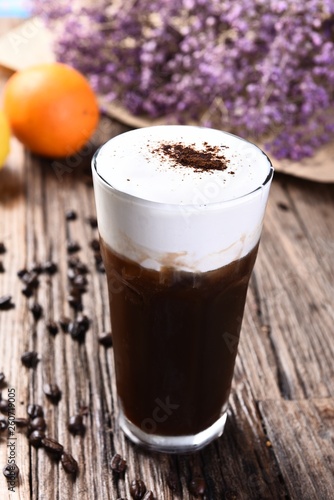 Fototapeta Naklejka Na Ścianę i Meble -  cup of coffee with whipped cream on white background