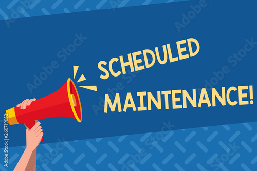 Handwriting text Scheduled Maintenance. Conceptual photo predetermined maintenance carried out at regular time Human Hand Holding Tightly a Megaphone with Sound Icon and Blank Text Space
