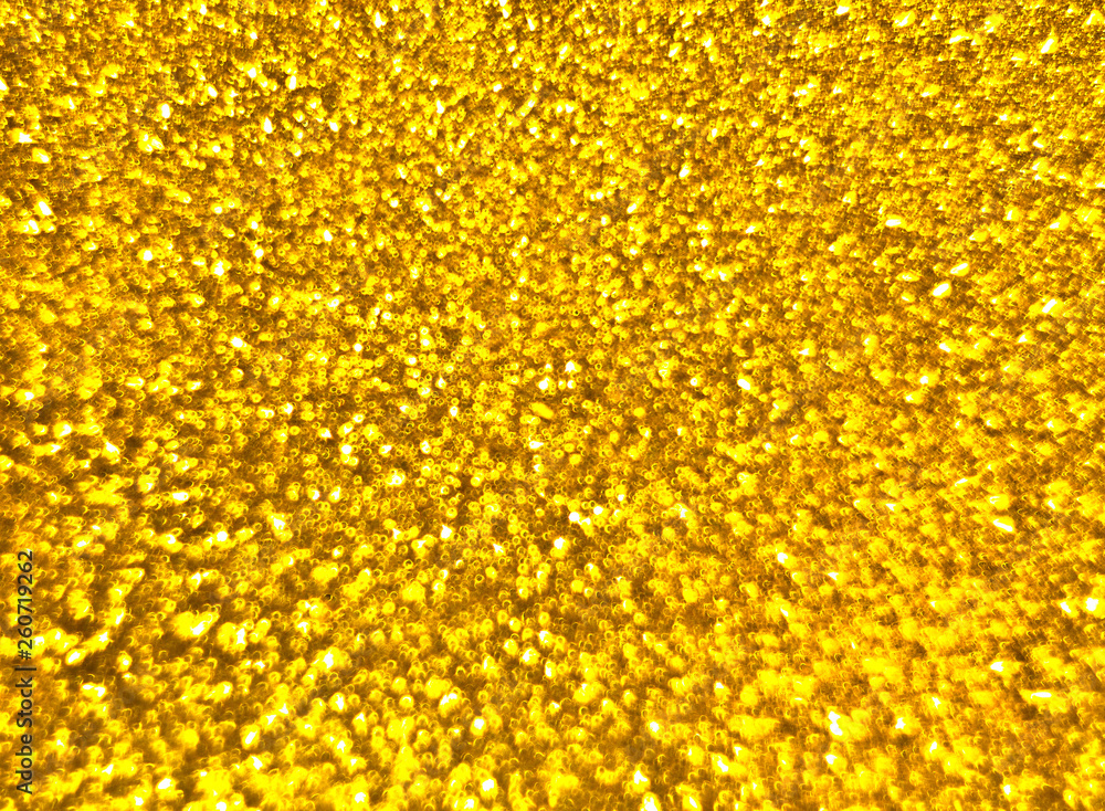 Textured golden background with brilliance Textured golden background with brilliance