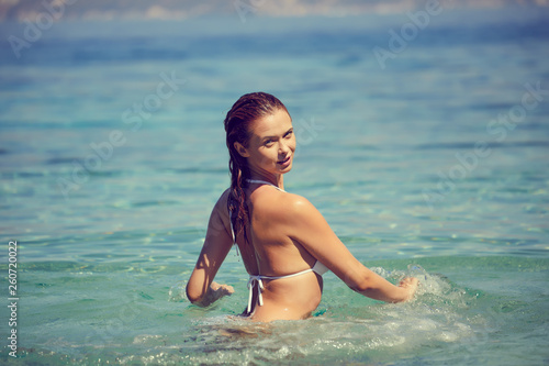 Beautiful woman posing on the beach. In Croatia © ZoomTeam