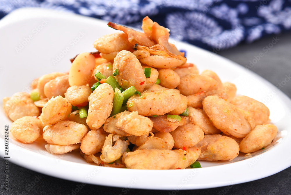fried potatoes with sauce on a plate fried potatoes with sauce on a plate