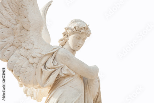 Antique stone statue of angel isolated on white background