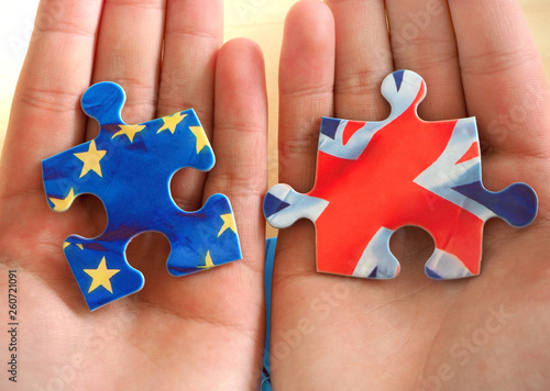 Puzzle with Great Britain and European Union flags. Brexit concept photo