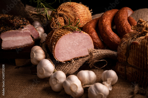 Traditionally smoked, homely sausage in composition with fresh garlic and herbs