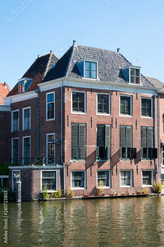 building with reflection in canal, Leiden, The Netherlands