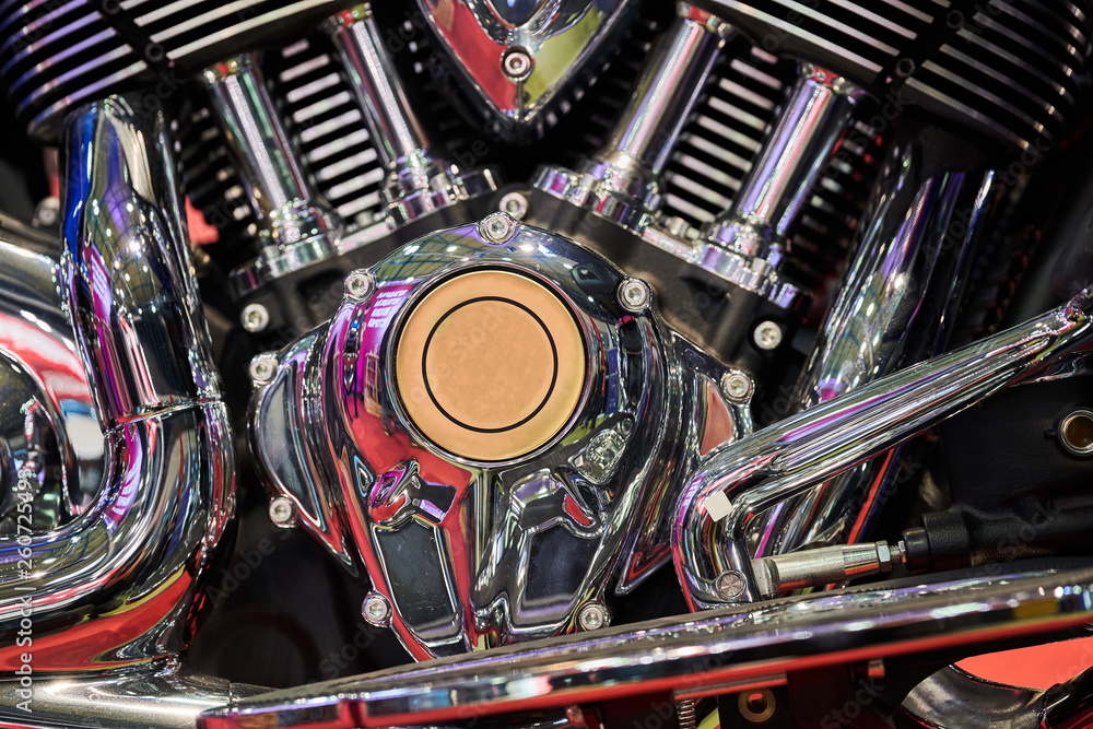 The powerful engine of a modern motorcycle closeup. The layout of the motor The powerful engine of a modern motorcycle closeup. The layout of the motor