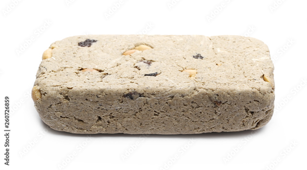 Halvah with raisins and peanuts isolated on white background Halvah with raisins and peanuts isolated on white background